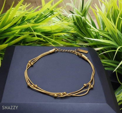 Snazzy Golden Whisper Bracelet BL1